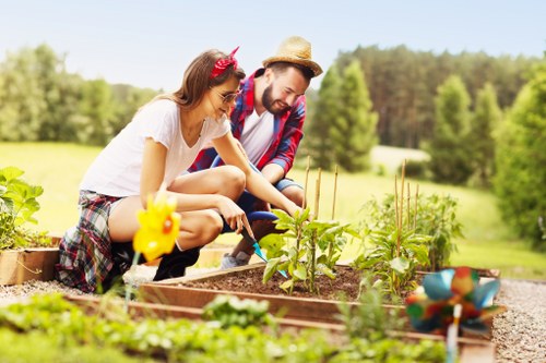 Gardener working on lawn maintenance in Victoria